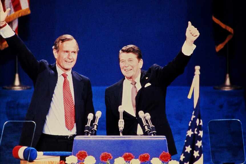 Ronald Reagan and George Bush celebrate on stage at the 1980 Republican convention.