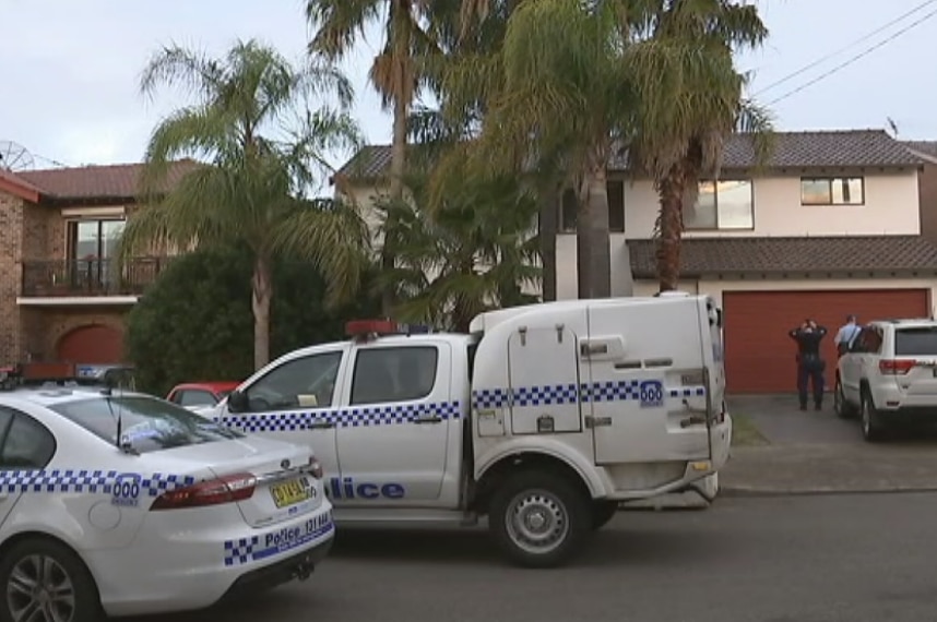 Police cars parked outside a home in Prothero Place, Pagewood