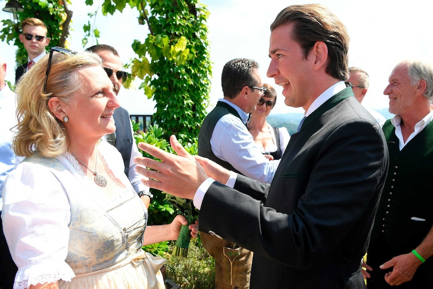 Austria´s Foreign Minister Karin Kneissl talks to Austria's Chancellor Sebastian Kurz