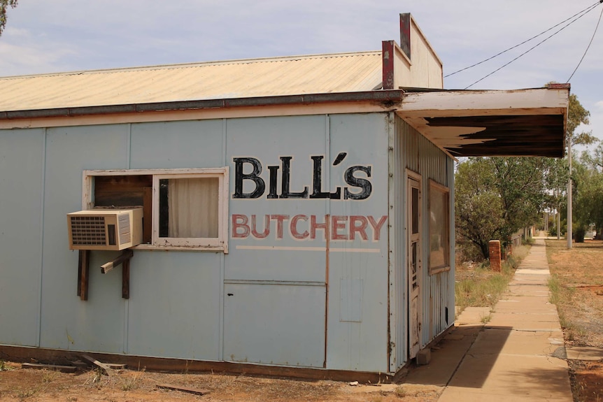 An old butcher shop sits in a state of disrepair in Ivanhoe.