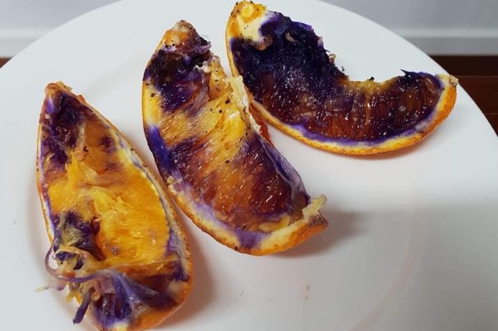 Slices of orange with purple colouring