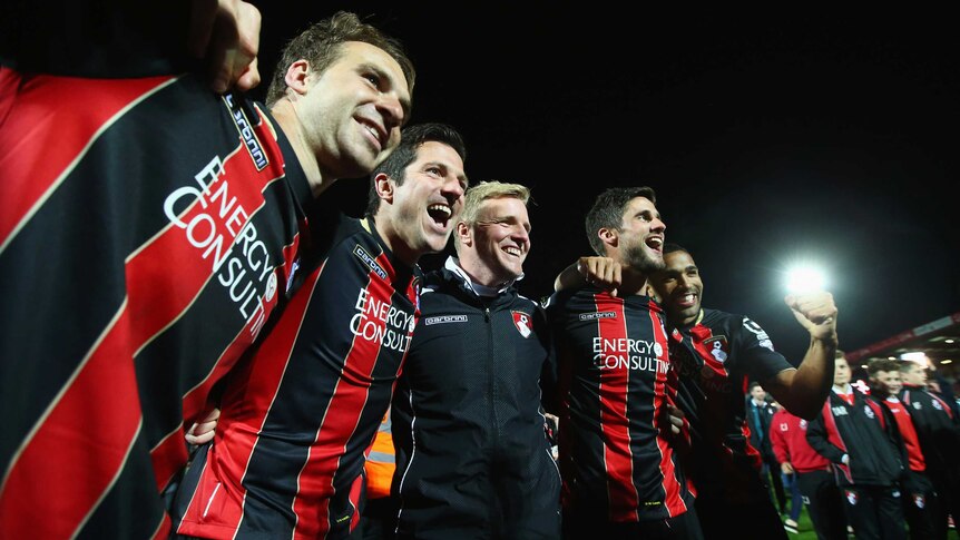 Bournemouth players celebrate promotion to Premier League
