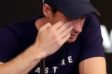 Britain's Andy Murray wipes tears from his face during a press conference at the Australian Open tennis championships.