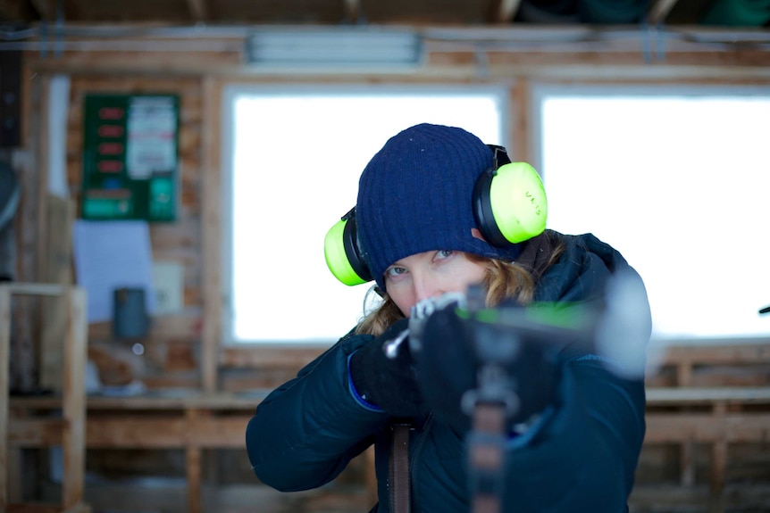 Pieta Houlihan, an Australian living in Svalbard, doing some shooting practise.