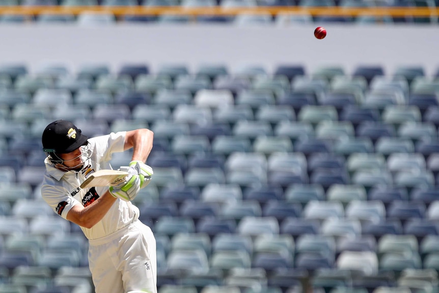 Cameron Bancroft plays defensively on the leg side for Western Australia against South Australia.