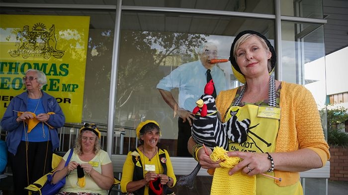 Knitting Nanna Against Gas Louise Somerville outside Thomas George's office