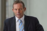 Corridors of power: Mr Abbott has committed his party to a head-on confrontation with the  Government over climate change.
