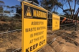 Image of an asbestos warning sign taken near Southern Cross, Western Australia.