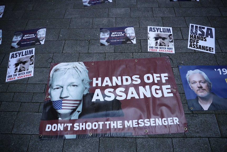 Julian Assange protest placard