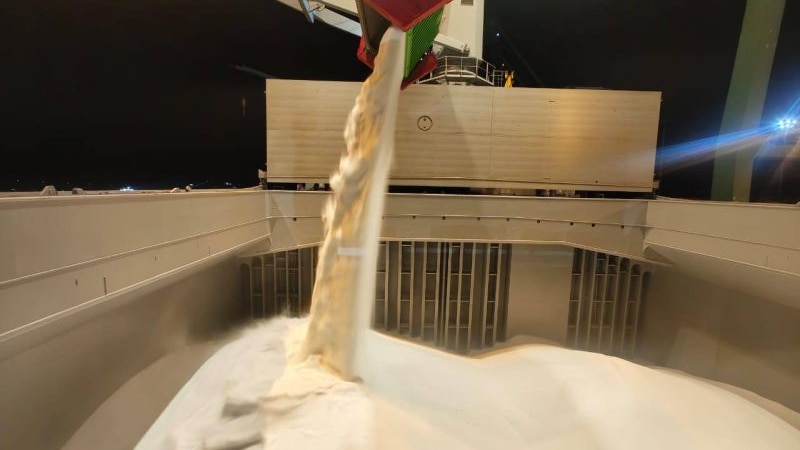 Urea being loaded on to a ship