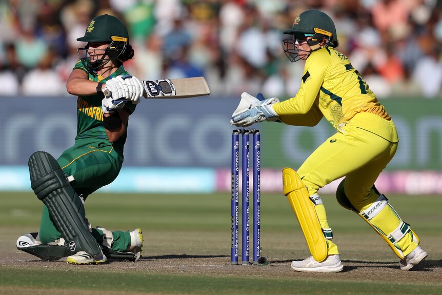 Laura Wolvaardt plays a sweep shot for South Africa against Australia.