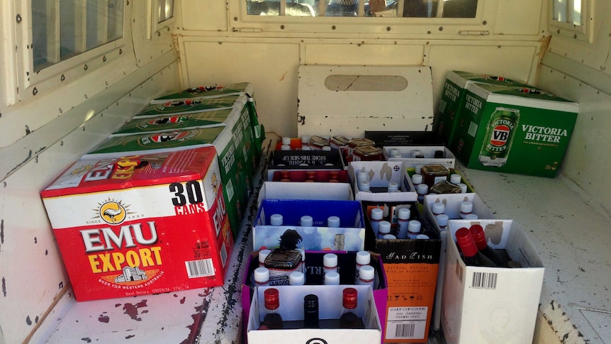 Bottles of seized black-market liquor fill the back of a police van in the Kimberley. March 10, 2014.