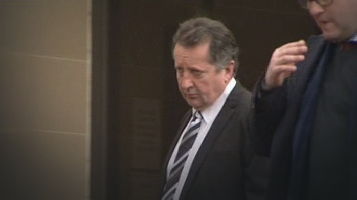 Sean Peter Burk leaves court in Hobart.