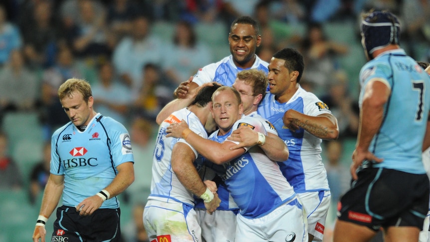 Stunned in Sydney ... the Waratahs became the Force's first victims of the 2012 Super Rugby season.