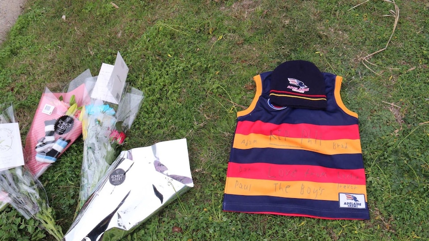 Crows guernsey left in tribute to Phil Walsh