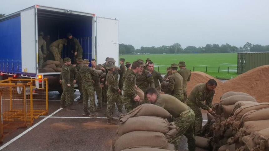 Soldiers from 3 Brigade in Townsville building sandbags