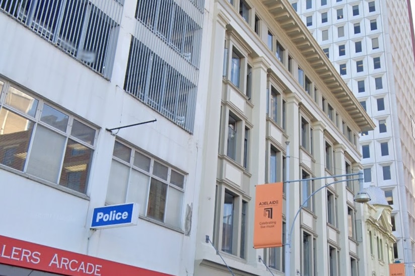 The facade of the Hindley Street police station and an adjacent building in Adelaide's CBD.