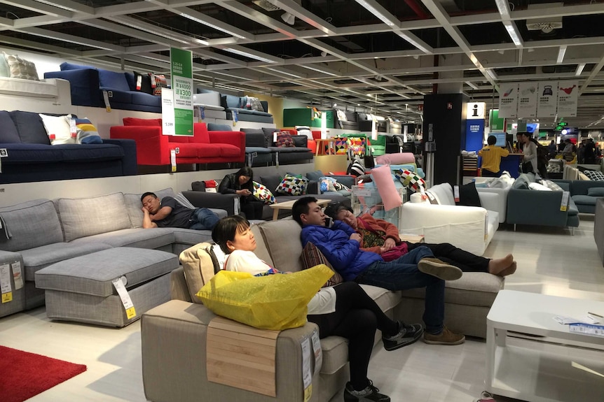 Ikea customers napping in Beijing
