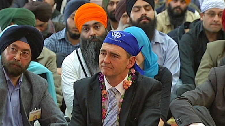 Mr Brumby attended a Sikh temple the day before leaving for India.