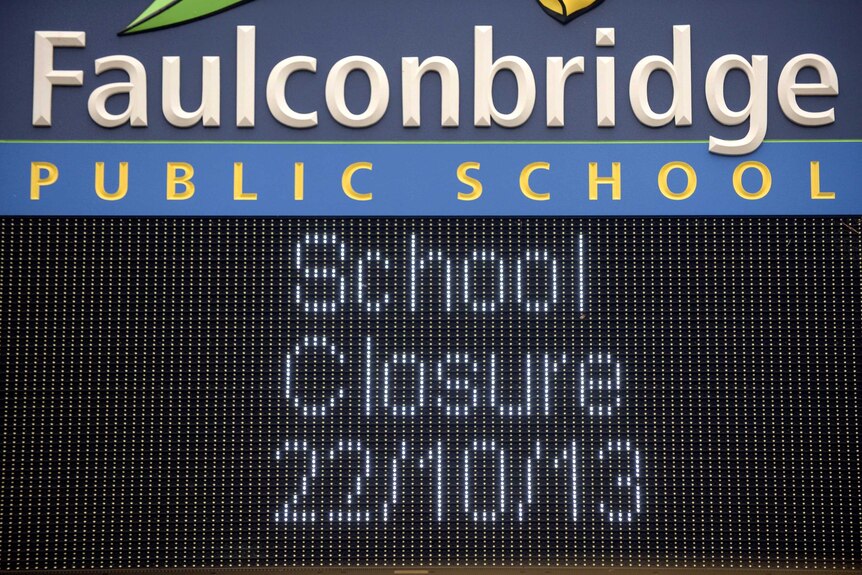 Sign in front of Faulconbridge public school announces the closure of the school.