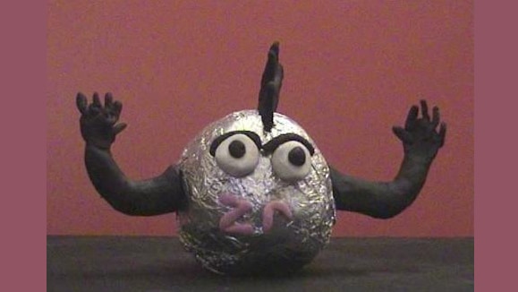 A cartoon model of zirconium with face and arms