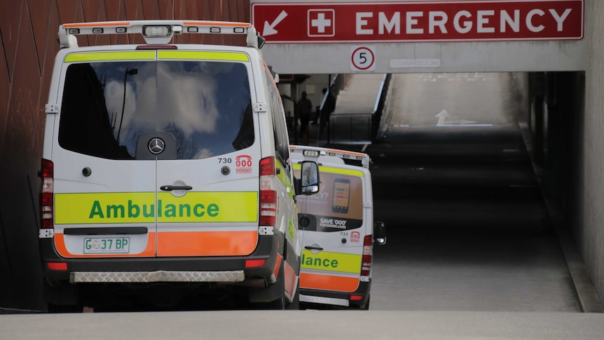 A line of ambulances queued up down the ramp to the emergency department at the Royal Hobart Hospital.