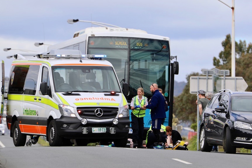 Pedestrian being attended to after being hit by school bus, Tasmania 9 November, 2018.