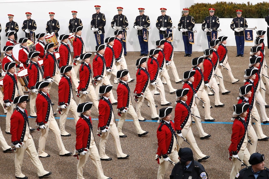 Marchers take part in US President Donald Trump's inaugural parade.