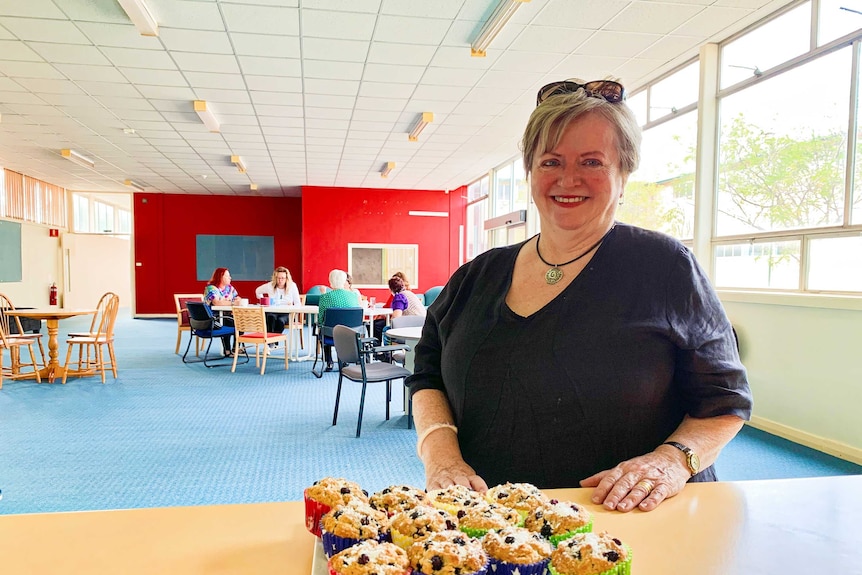 Ms Whelan with cookies on a bench