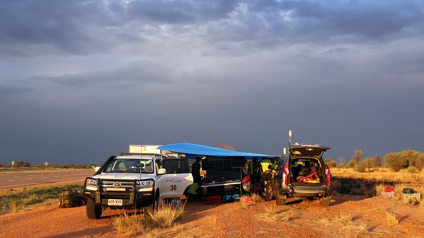 A team in the 2017 Solar Challenge sets up camp during the 3,000 kilometre race from Darwin to Adelaide.