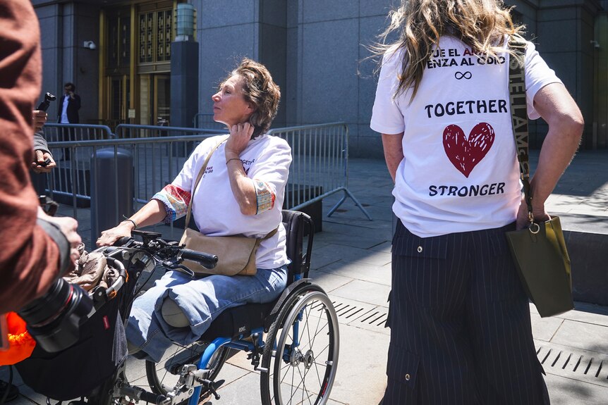 Marion Van Reeth leaves Manhattan federal court in a wheel chair after making her victim statement.