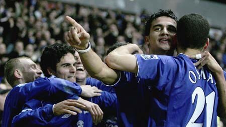 Tim Cahill (pointing) and Leon Osman celebrate Everton win over Aston Villa