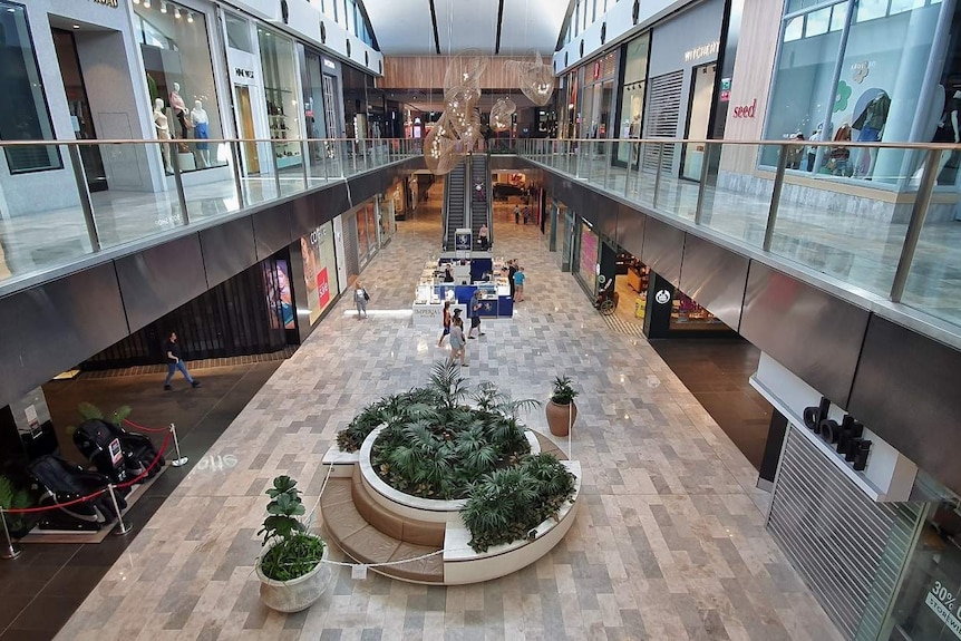 Two stories at Chermside shopping centre with very few people in it.