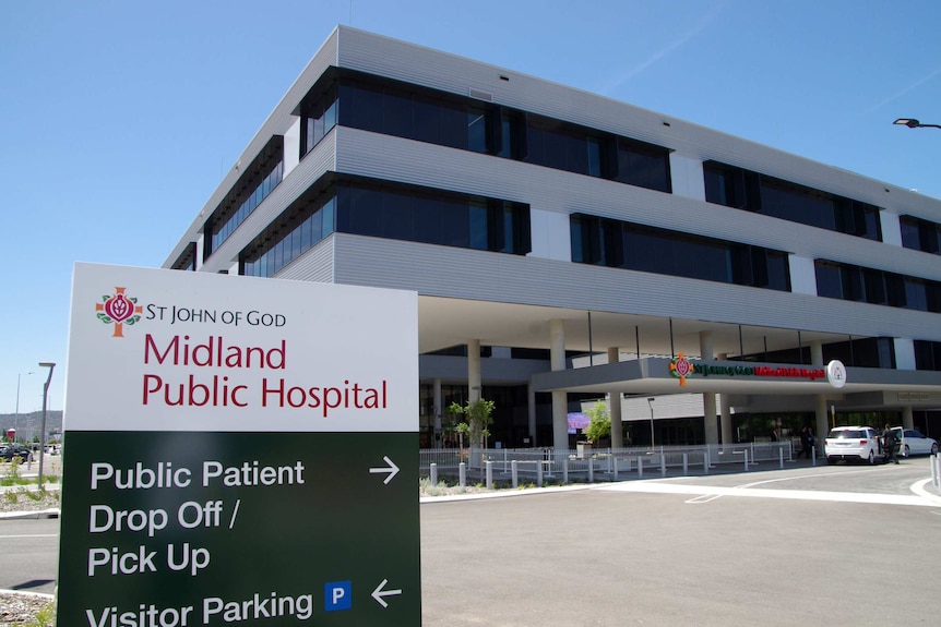 Entrance to Midland Public Hospital, including sign in foreground