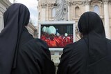 Nuns watch conclave mass
