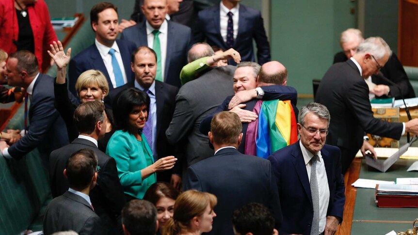 Christopher Pyne hugging Trent Zimmerman