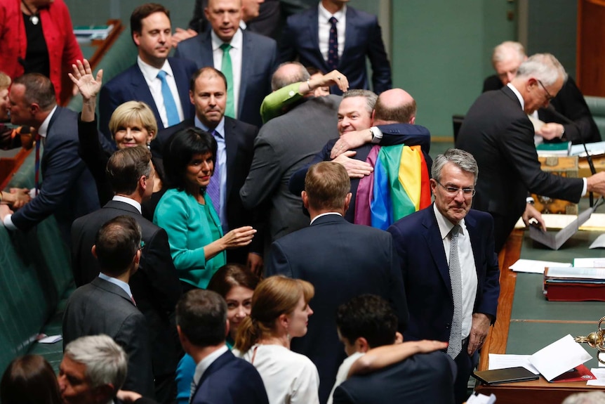 Christopher Pyne hugging Trent Zimmerman