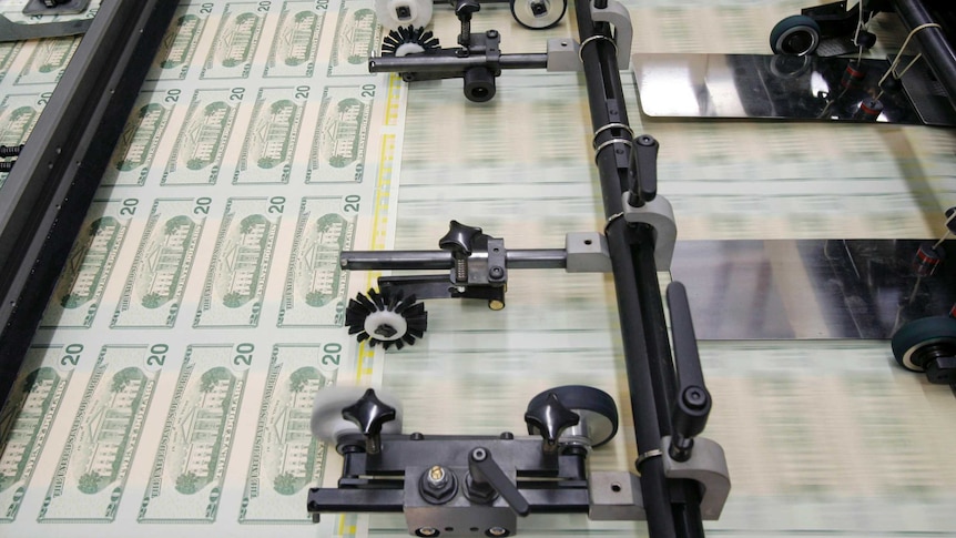 Twenty dollar bills printed at the US Treasury.