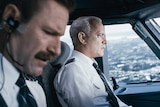 Eckhart and Hanks in the movie Sully