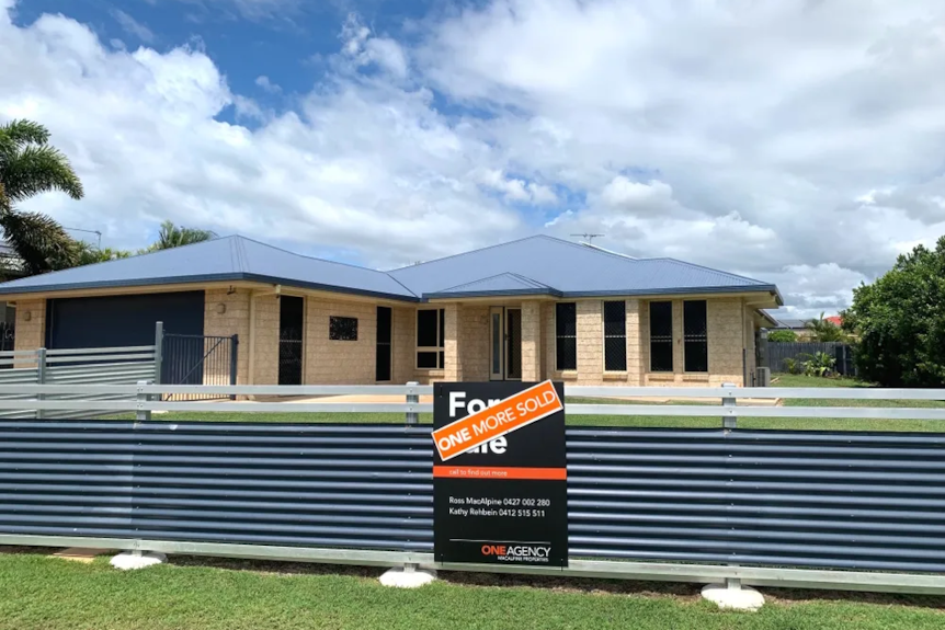 Brick home in Gracemere with sold sign outside. 