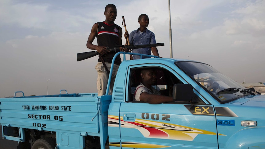 Members of Civilian Joint Task Force on patrol in Maiduguri.