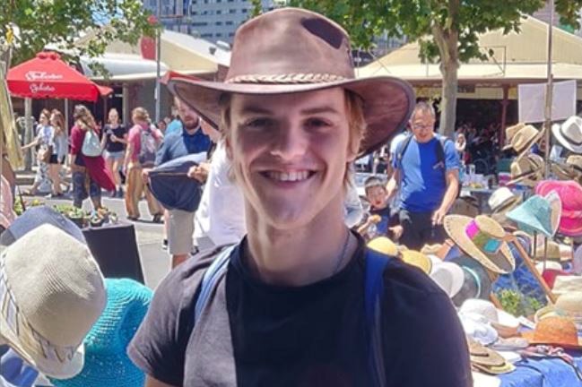 A young man wearing an Akubra hat