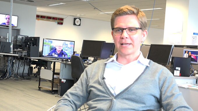 Liam Fox sitting in his office