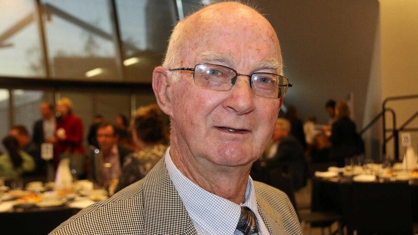 A head and shoulder shot of investor Bob Perks at a business breakfast in Perth.