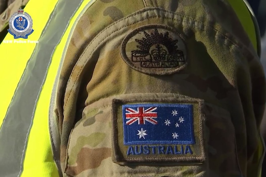 A badge of the Australian flag on the arm of an army soldier