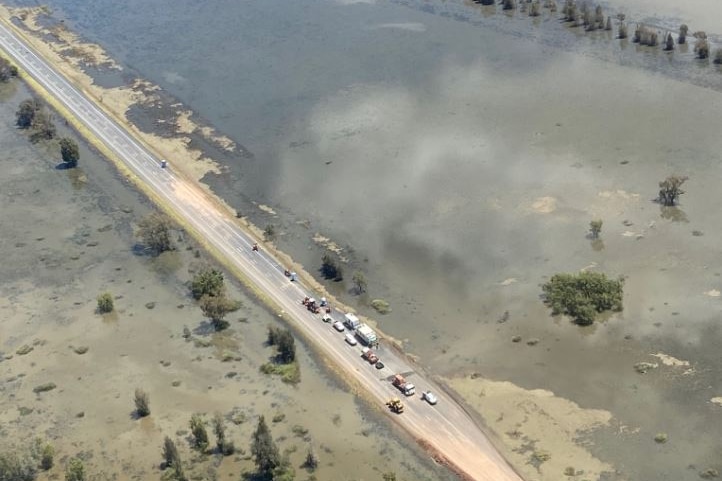 An overhead shot of floodwater on the edge of Newell Highway