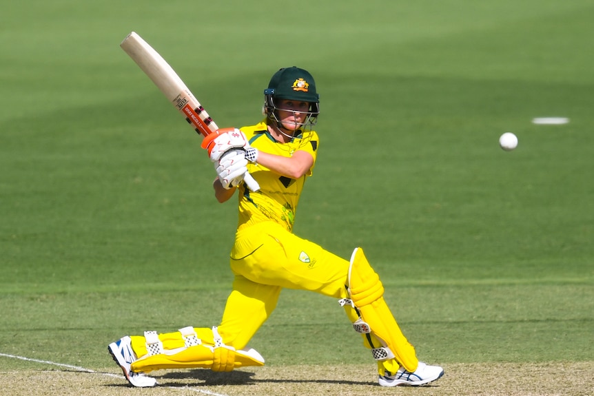 Beth Mooney plays a pull shot against England.