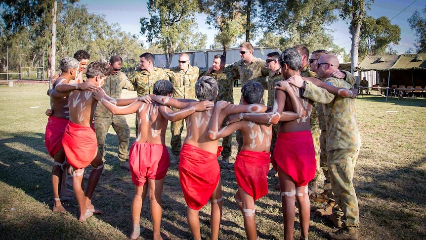 Indigenous dance troupe performs with soldiers at Toomelah