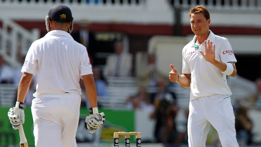 South Africa's Dale Steyn (R) knocks over England's Jonathan Trott in the Lord's Test last month.