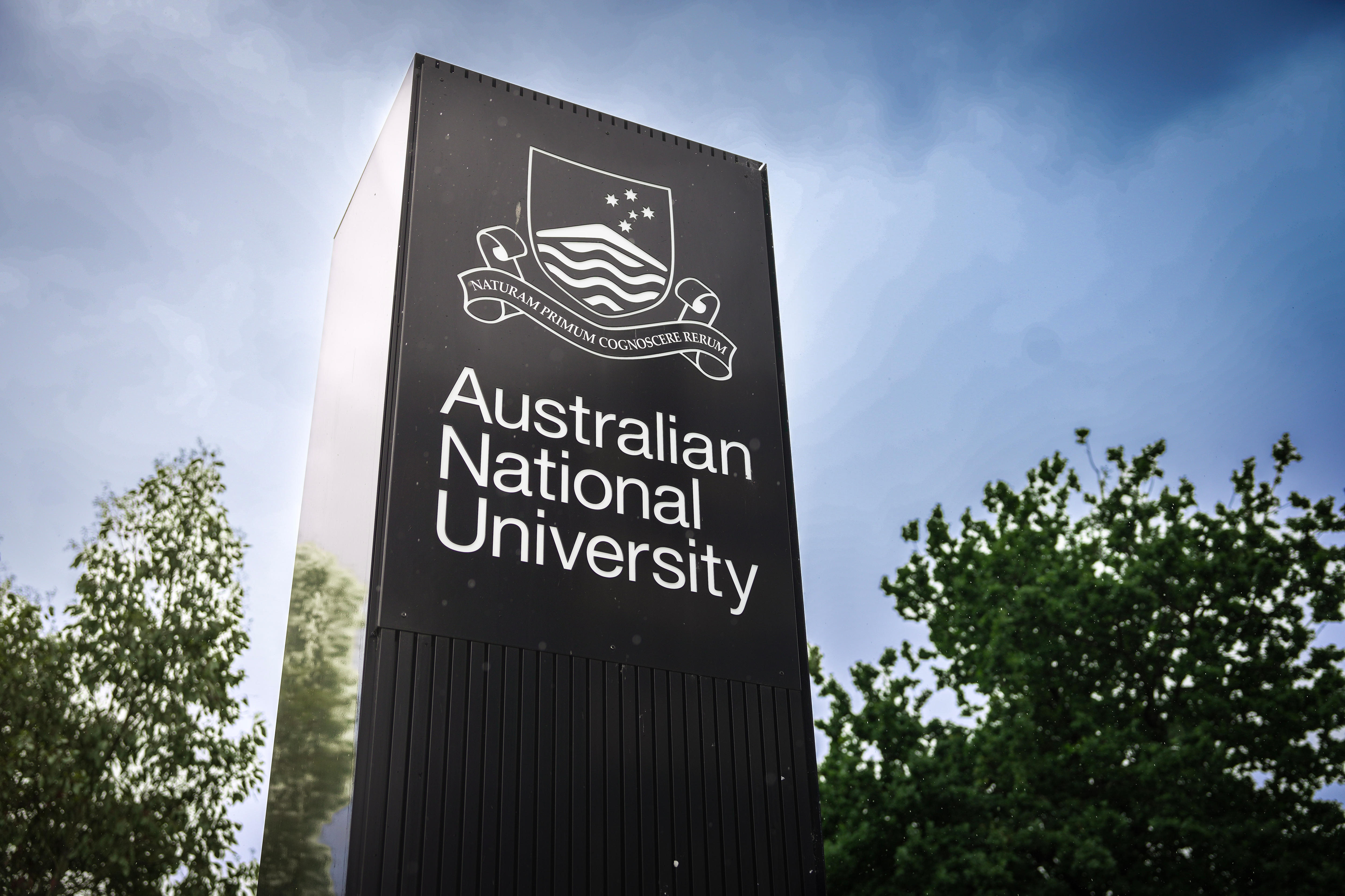 Australian National University street sign and logo